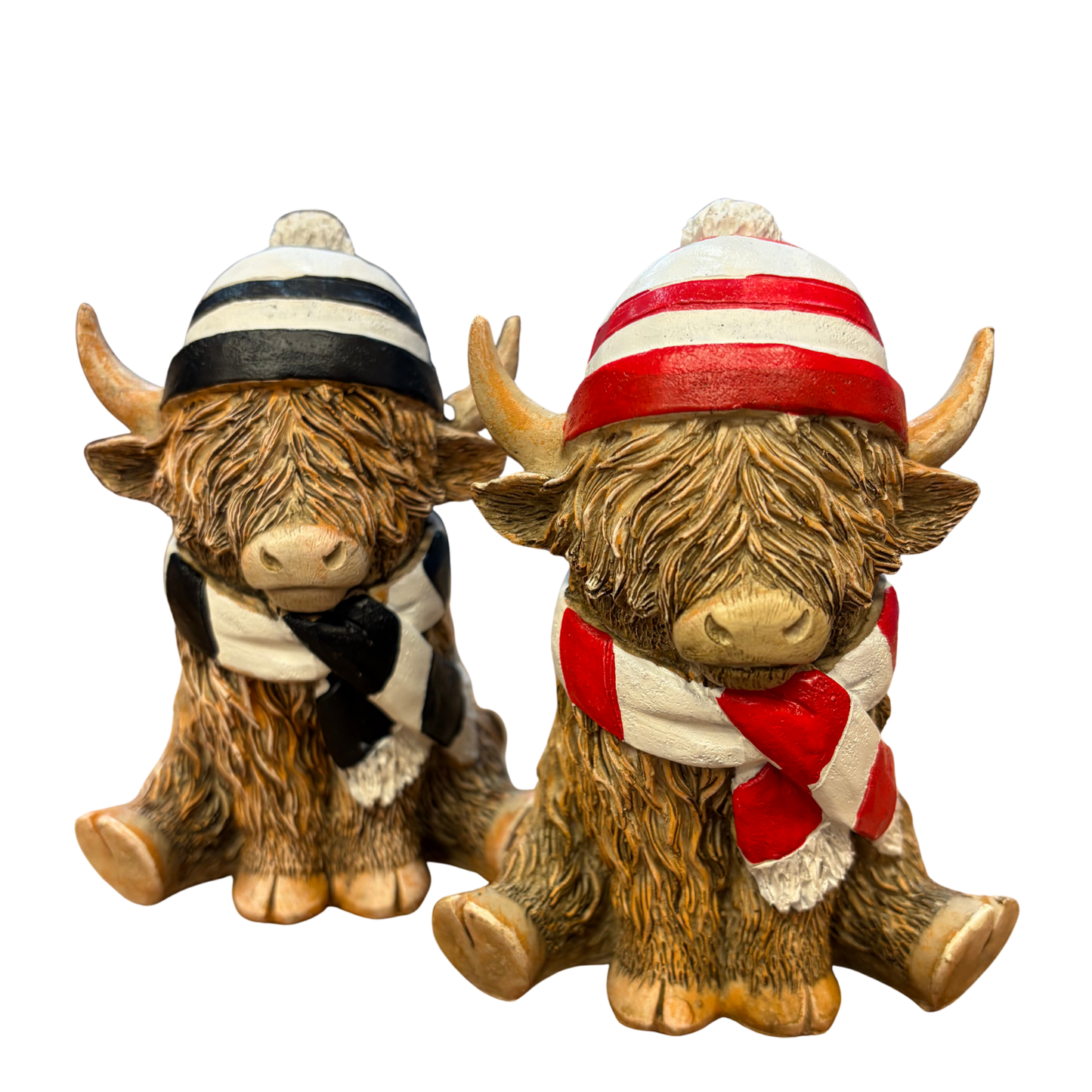 Black and white coloured football mad highland cow figurine