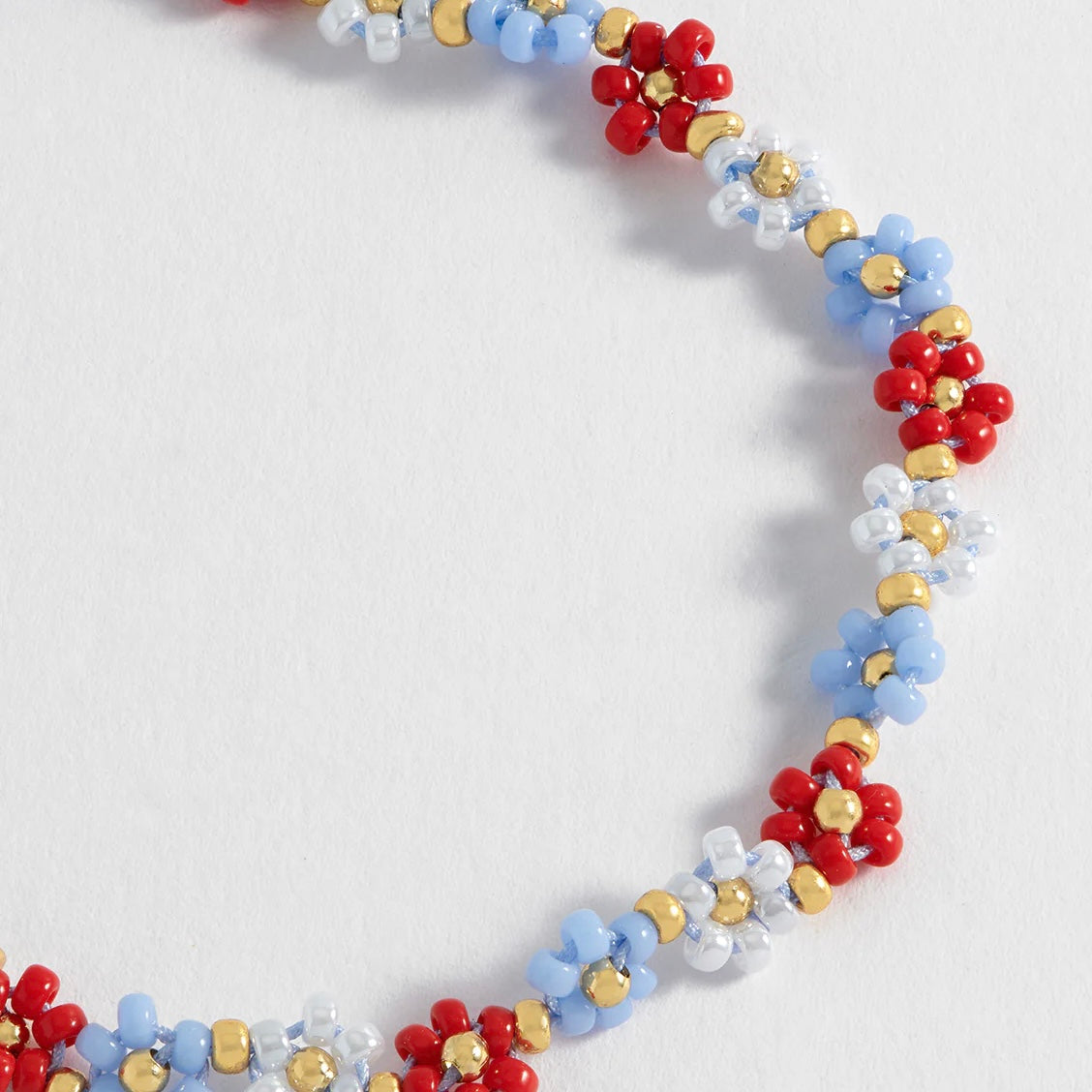 ESTELLA BARTLETT- Daisy Chain Bracelet Gold Plated - Red and Blue